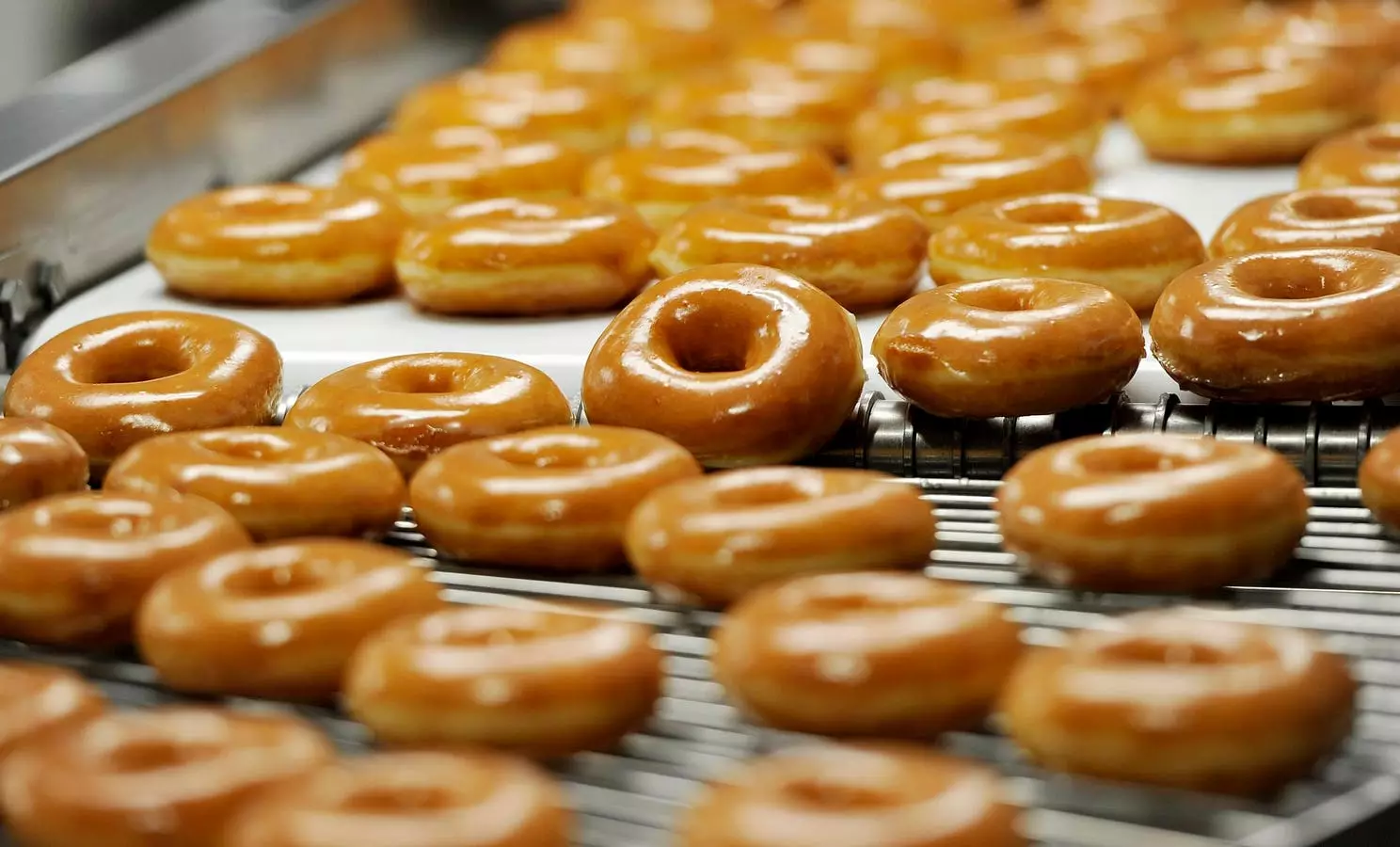 Doughnuts and Delights: Krispy Kreme’s Festive ‘Day of the Dozens’